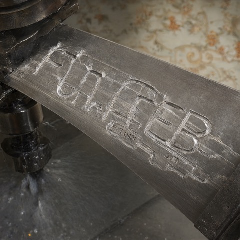 Qwen-Image 2.1 · RTX 5090 · 32 GB · cnc-forged-blade, seed 4211